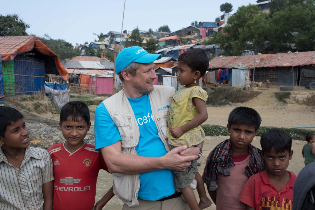 marth worth, head of Wash, holding Bangladeshi children 