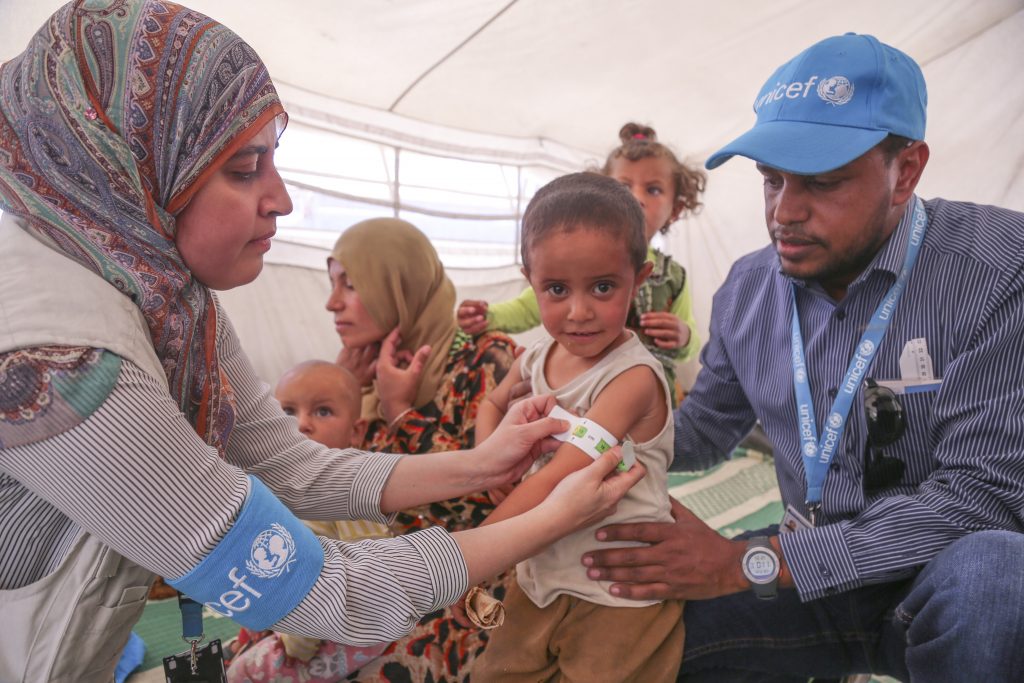 UNICEF Staff respond to the needs of children displaced by conflict in Syria.