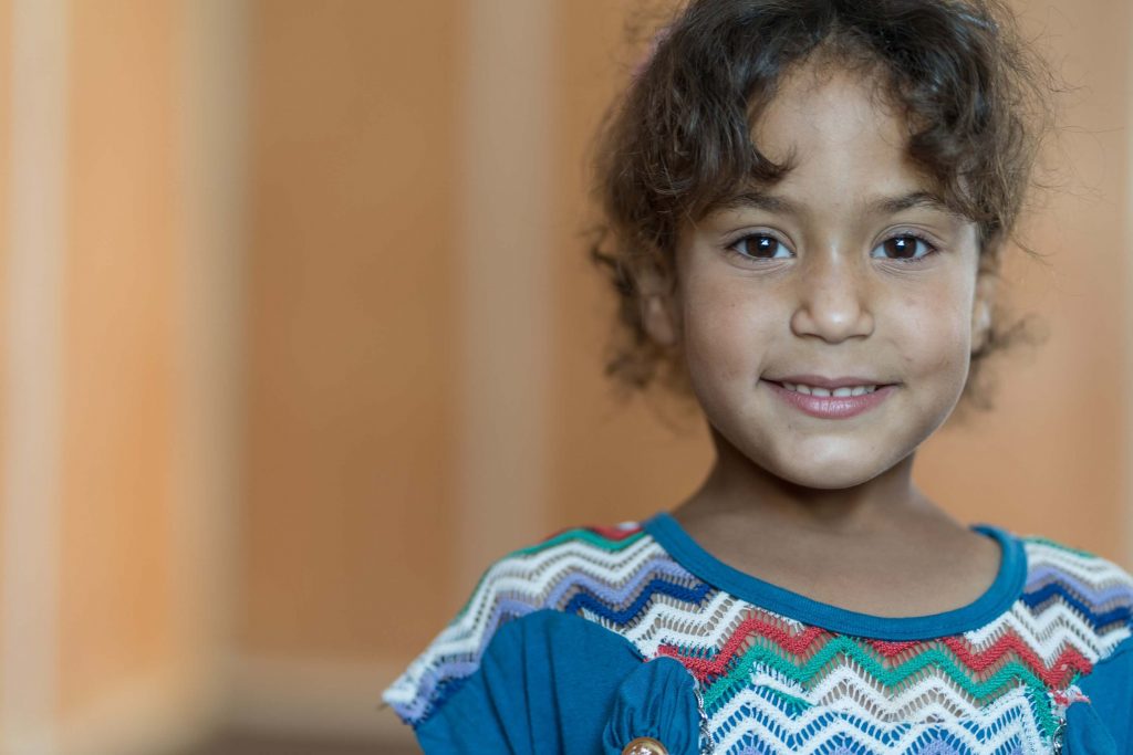 Little Girl smiling at the camera