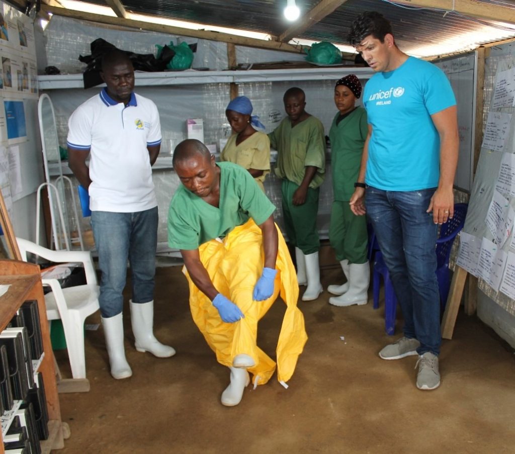 UNICEF Ambassador Donncha O'Callaghan witnesses doctors preparing to treat Ebola patients in DRC