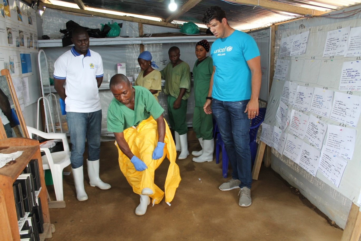 UNICEF Ambassador Donncha O'Callaghan witnesses doctors preparing to treat Ebola patients in DRC