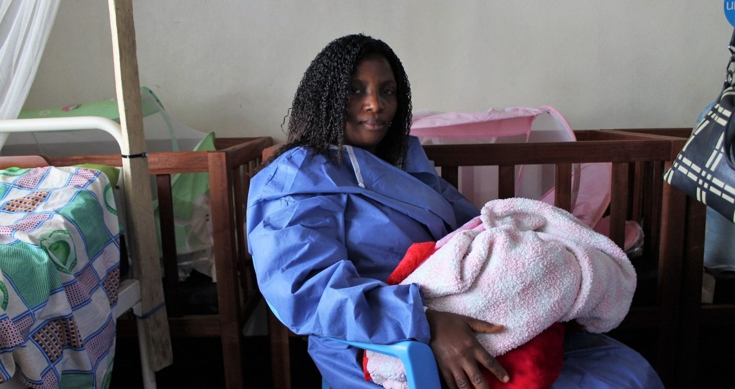 Ebola survivor Florida looks after children at UNICEF-supported creche in the DRC