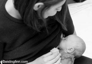 Mum breastfeeds days-old infant