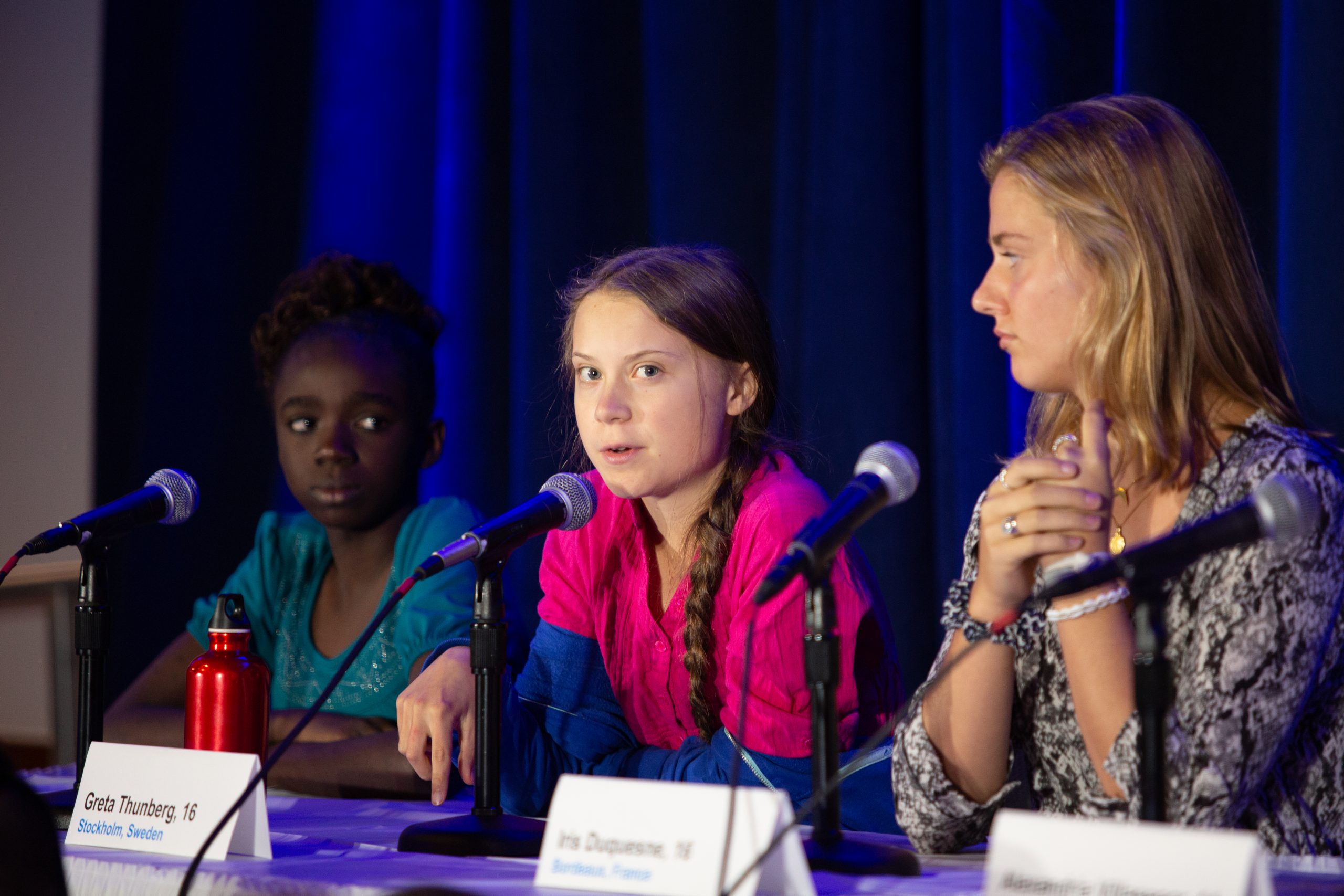 greta thunberg speaks at a conference