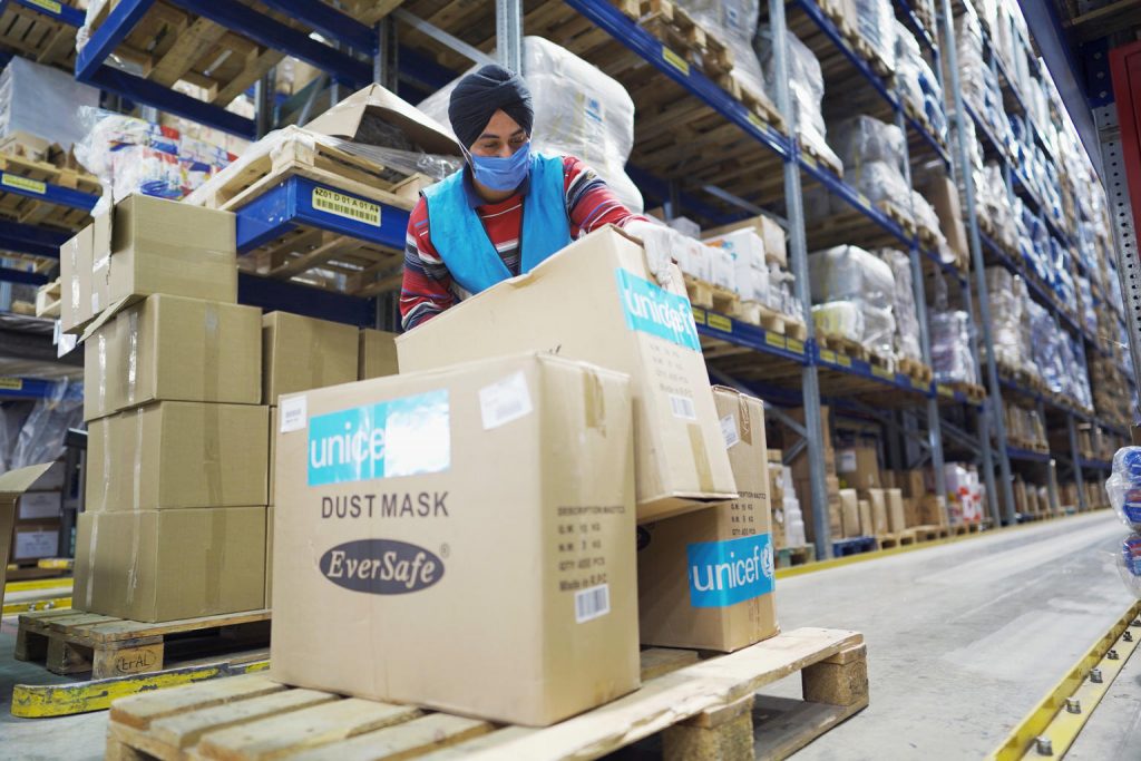 unicef work sorts PPE in Beirut warehouse