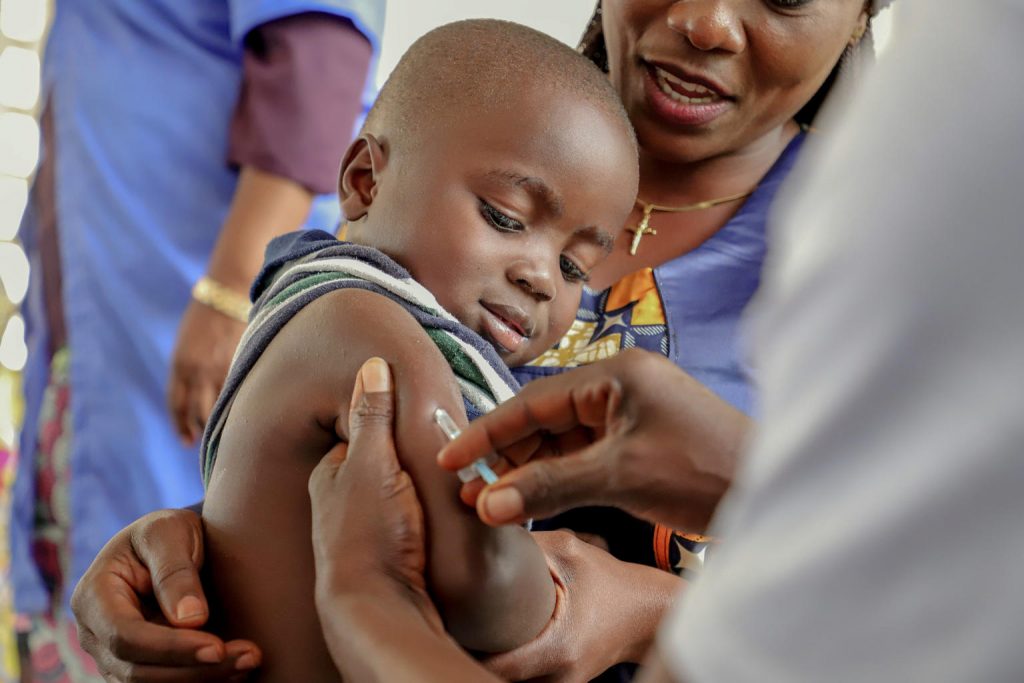 boy receives measles vaccine