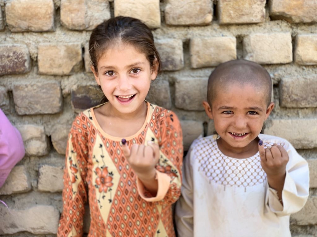 children receive polio vaccine