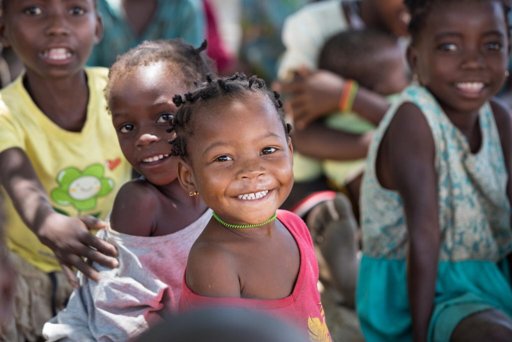 smiling girl looks at camera