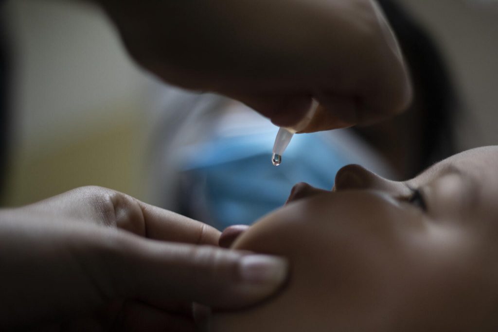 child vaccinated against polio