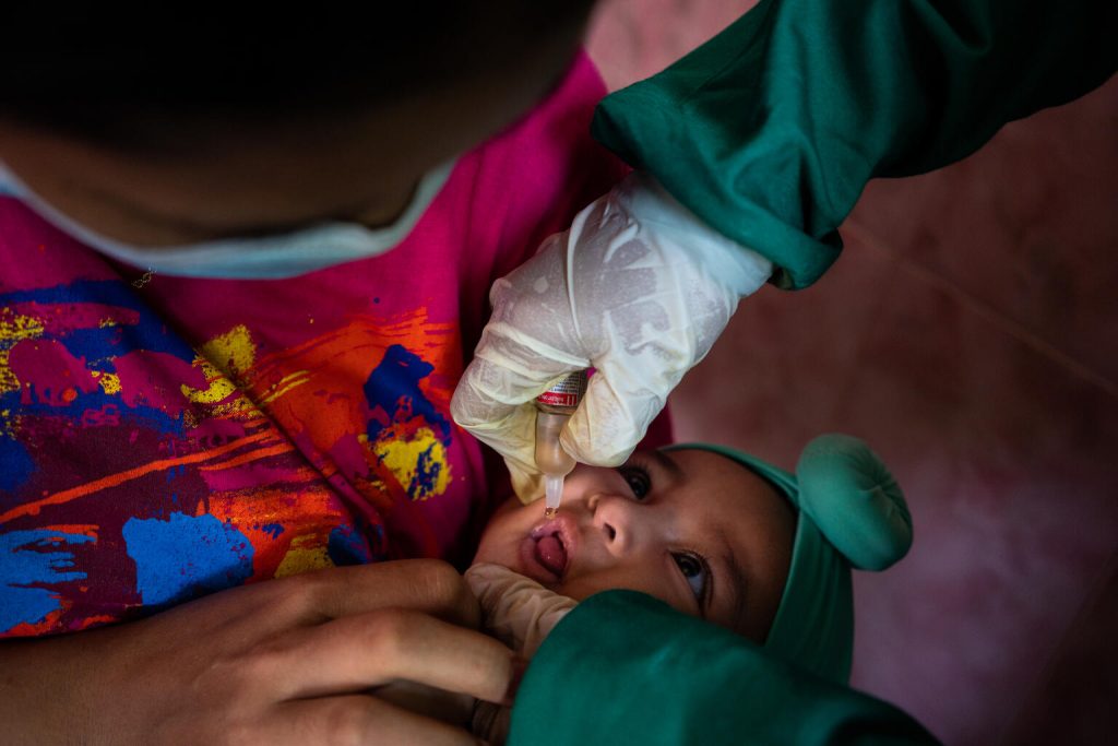 baby vaccinated against polio