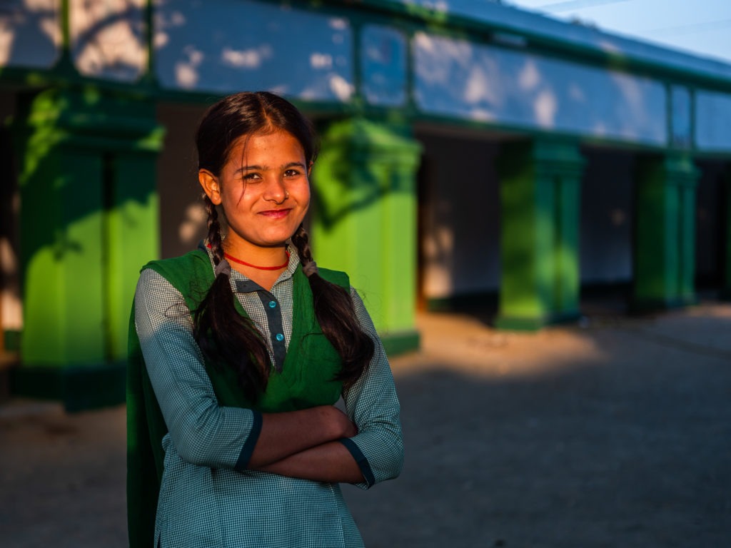 Indian girl smiles at camera