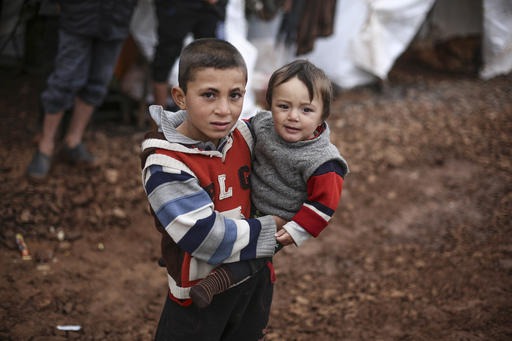 a boy is carrying another boy