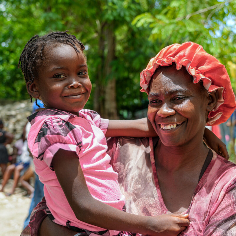 Christiana and her children live in conflict-hit Haiti and have received help from UNICEF supporters. 