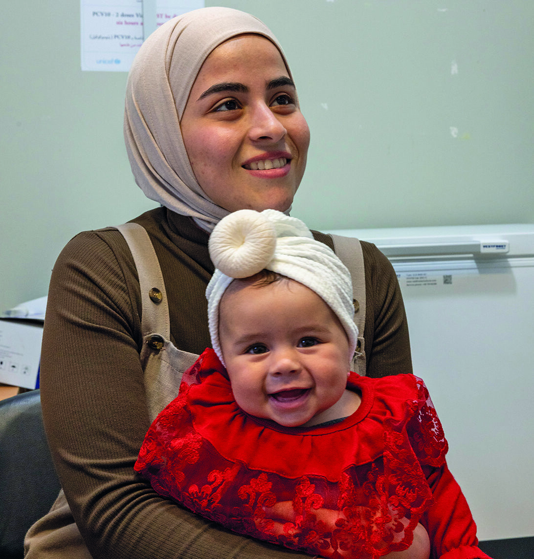 A happy baby with her mum