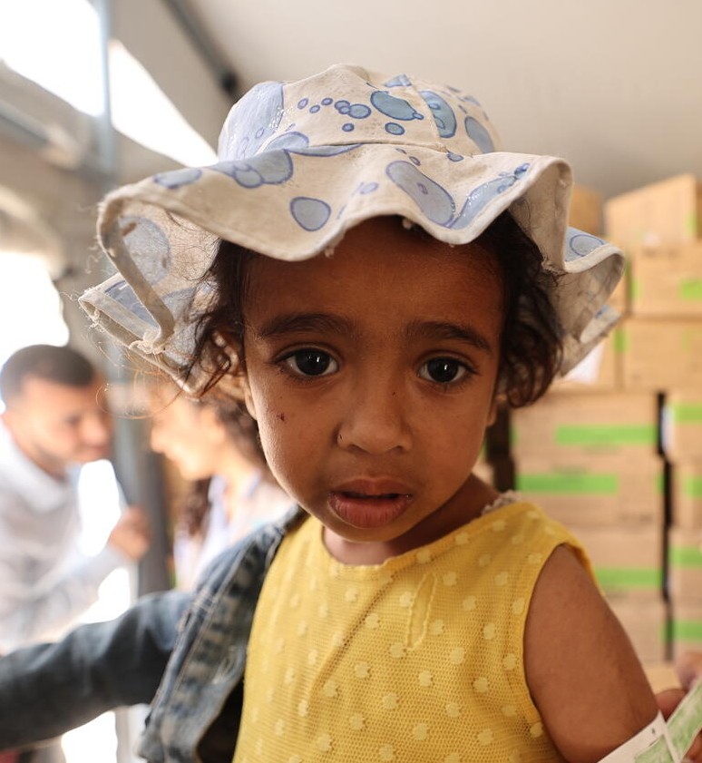 A child in Gaza awaits a Boxie donation from UNICEF supporters.