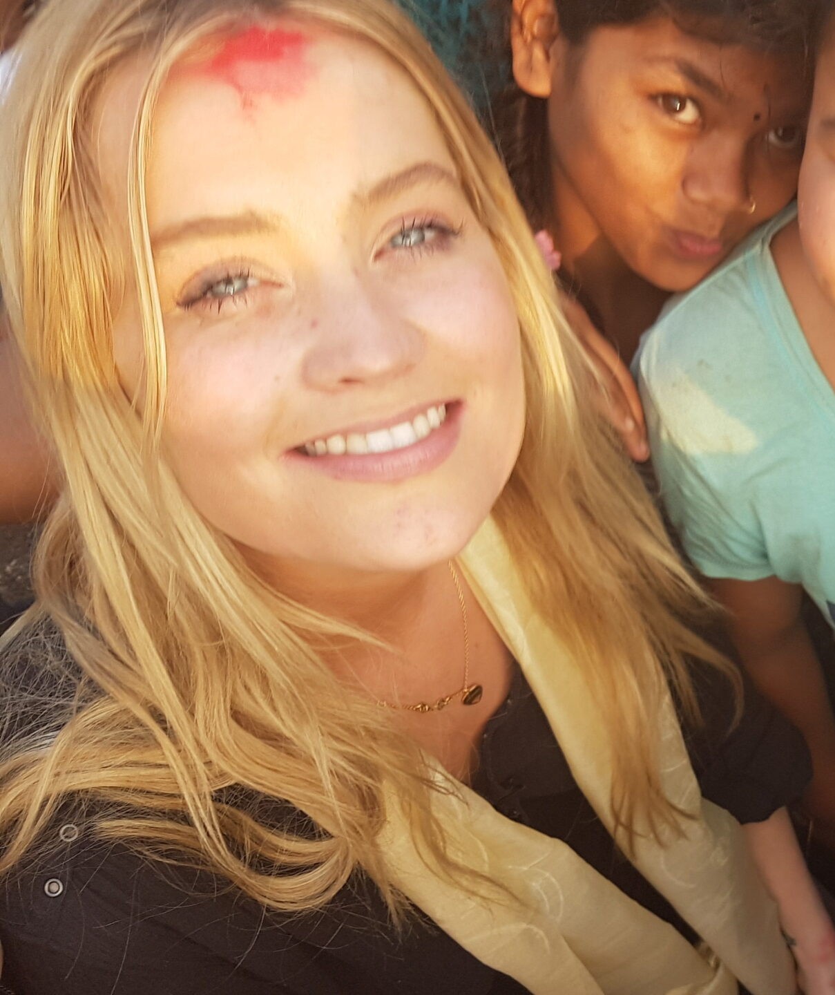 Laura Whitmore selfie with children.